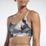 kvinner svart 2X42N715 Reebok lux strappy allover print fet bh - Bilde 4