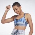 kvinner essensielt blått 2X42N873 Reebok lux sports-bh med reim med flytende abyss print
