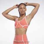 kvinner halvoransje bluss 2X42N416 Reebok lux racer vattert fargeblokkert BH
