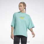 kvinner semi klassisk blågrønn 2X42N720 Reebok les mills lagdelt t-skjorte