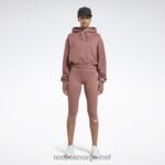 kvinner uttørket jord 2X42N617 Reebok hettegenser med victoria beckham crop-logo
