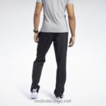 menn svart 2X42N1065 Reebok treningsnødvendigheter vevde ufôrede bukser - Bilde 4