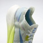 opal glød/syregul/essensiell blå 2X42N304 Reebok floatride energy x joggesko - Bilde 11