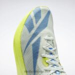 opal glød/syregul/essensiell blå 2X42N304 Reebok floatride energy x joggesko - Bilde 9